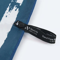 Palm Cove XL Beach Towel & Pouch Newlyfe