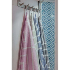newlyfe towel hanging in bath room