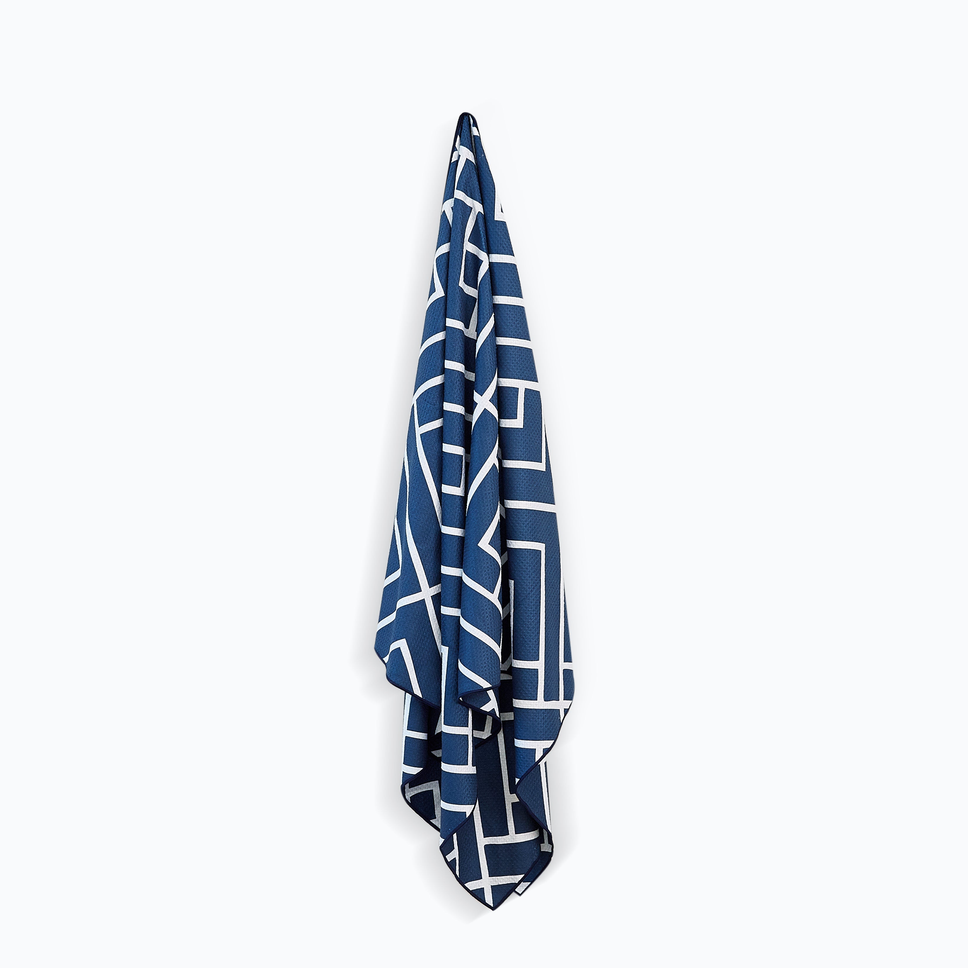 Navy Newlyfe waffle-weave bath towel hanging