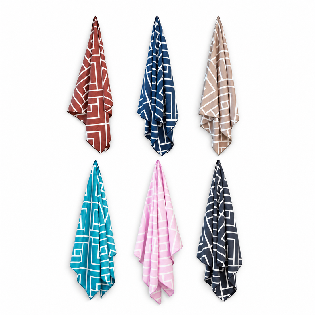 Six Newlyfe waffle-weave bath towels in Rust, Navy, Sandstone, Teal, Pink and Slate